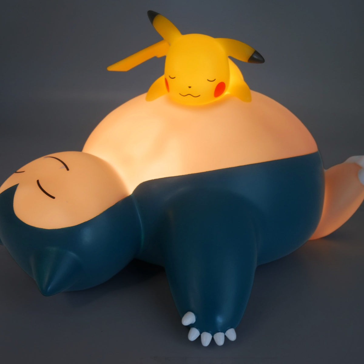 Figurine Lumineuse Ronflex et Pikachu endormi - Pokémon